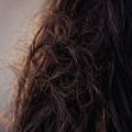 Image of wavy hair women on beach
