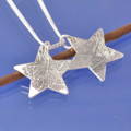 fingerprint necklace - stars engraved with your loved ones' prints