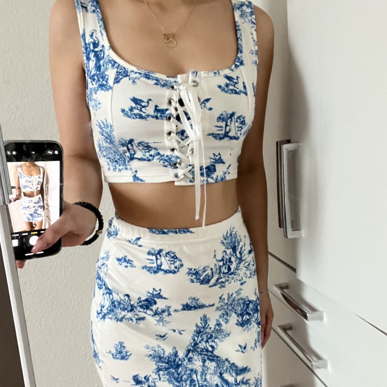 Two piece outfit (skirt and a crop top)