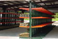 Lumber Storage Racks Orange and Green