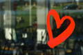 red heart drawing on glass window - Lily Gardner London