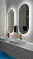Bathroom vanity mirrors with integrated LED lighting by Havit at DynamiQ Wellness Centre in Canberra ACT.