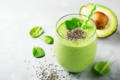 green smoothie with chia seeds, spinach, avocado and antioxidants to help fight aging