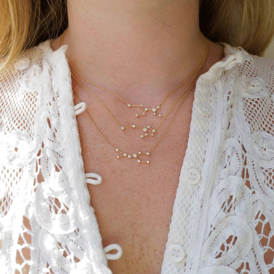 Close-Up of Three Zodiac Constellation Necklaces