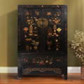 An exquisite antique Chinese black lacquer wedding cabinet from Shanxi province with hand painted flowers
