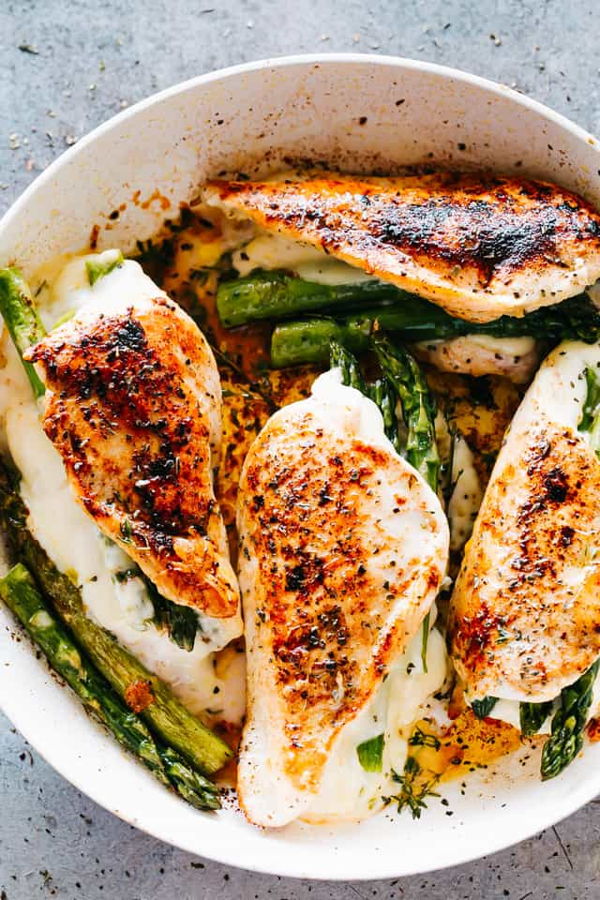 Photo of Broccoli Cheddar Stuffed Chicken with Rice Pilaf and Asparagus
