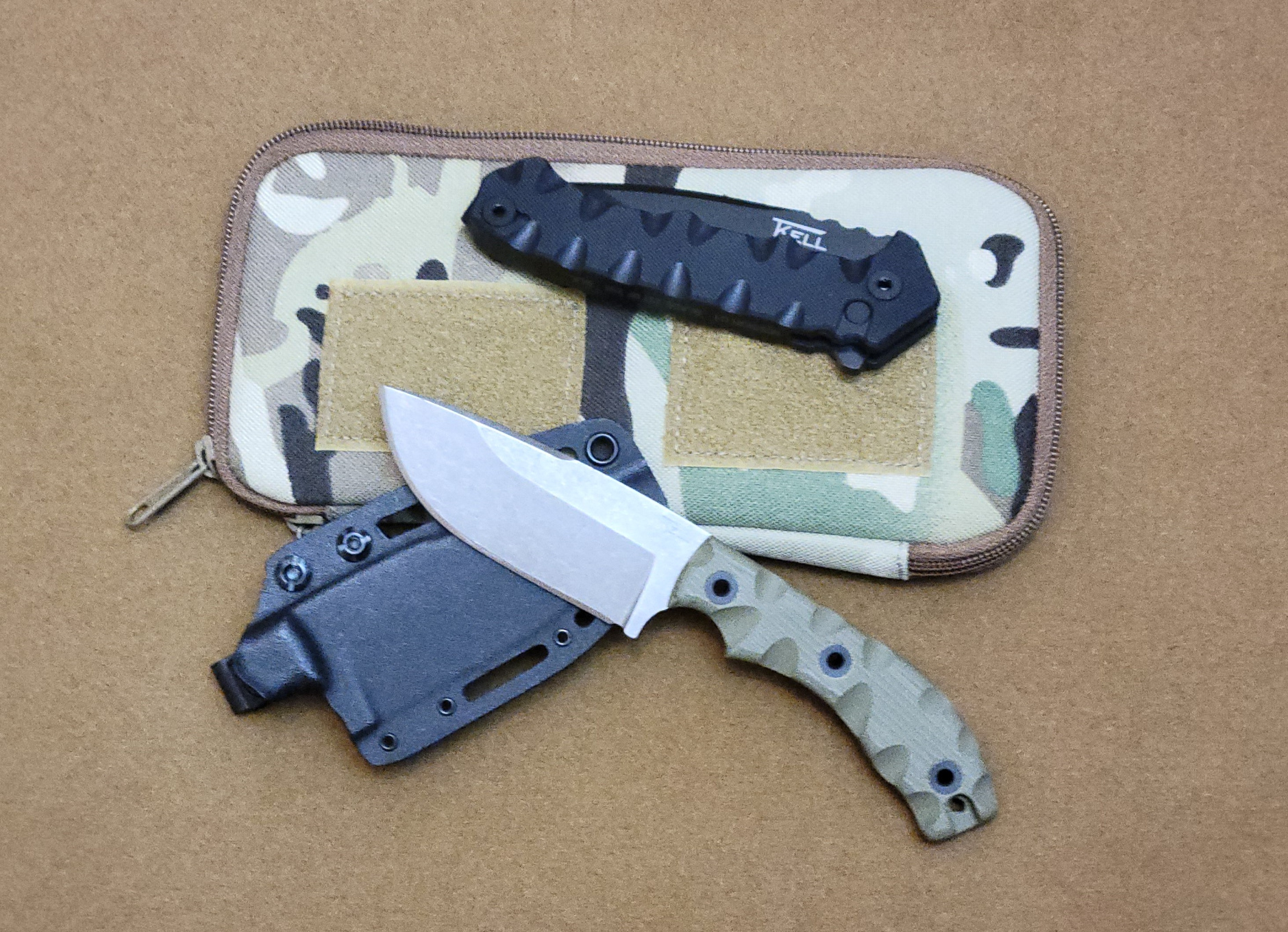 The Taylors Ridge with the extended grip in OD. And of course the TKell Patreon Folder. – by Phill