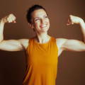 female-holding-arms-in-strong-pose