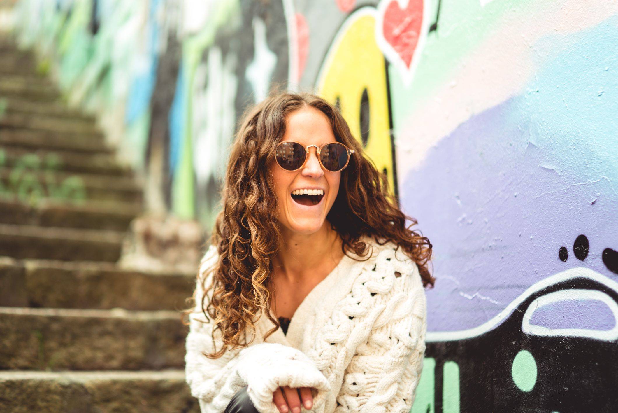 Picture of girl with wavy hair laughing