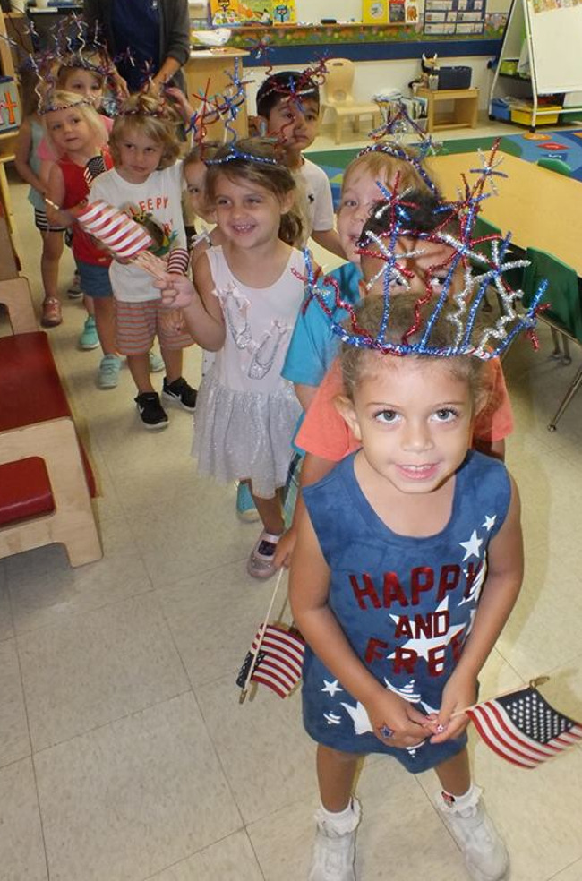  Primrose students celebrate fourth of july with flags and DIY decorative headbands