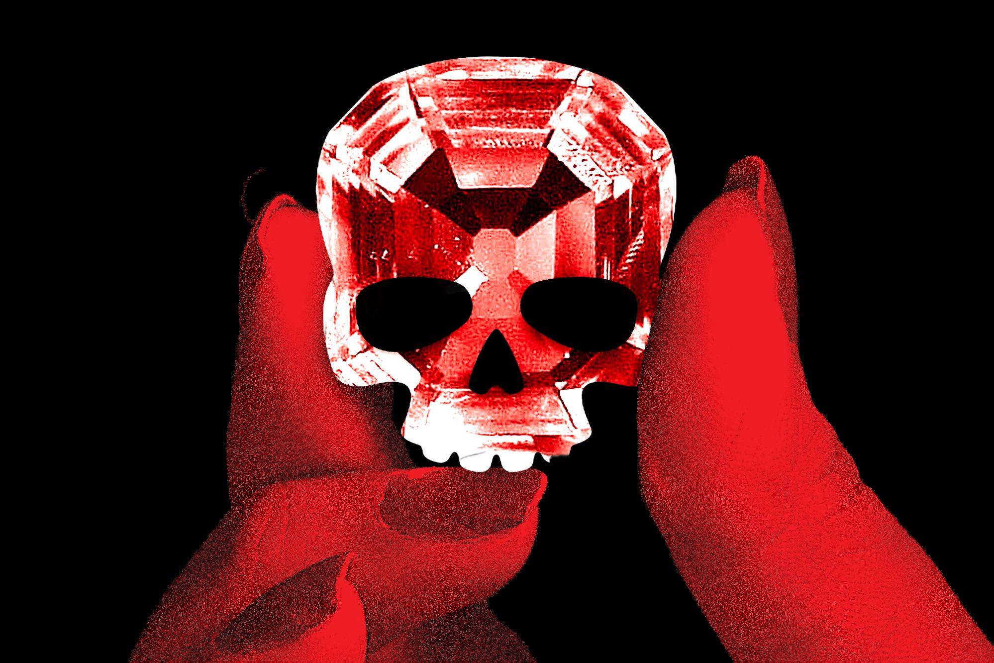 An illustration of a hand holding a diamond that is shaped like a skull.