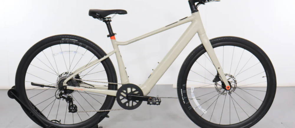 a white Velotric T1 electric city bike