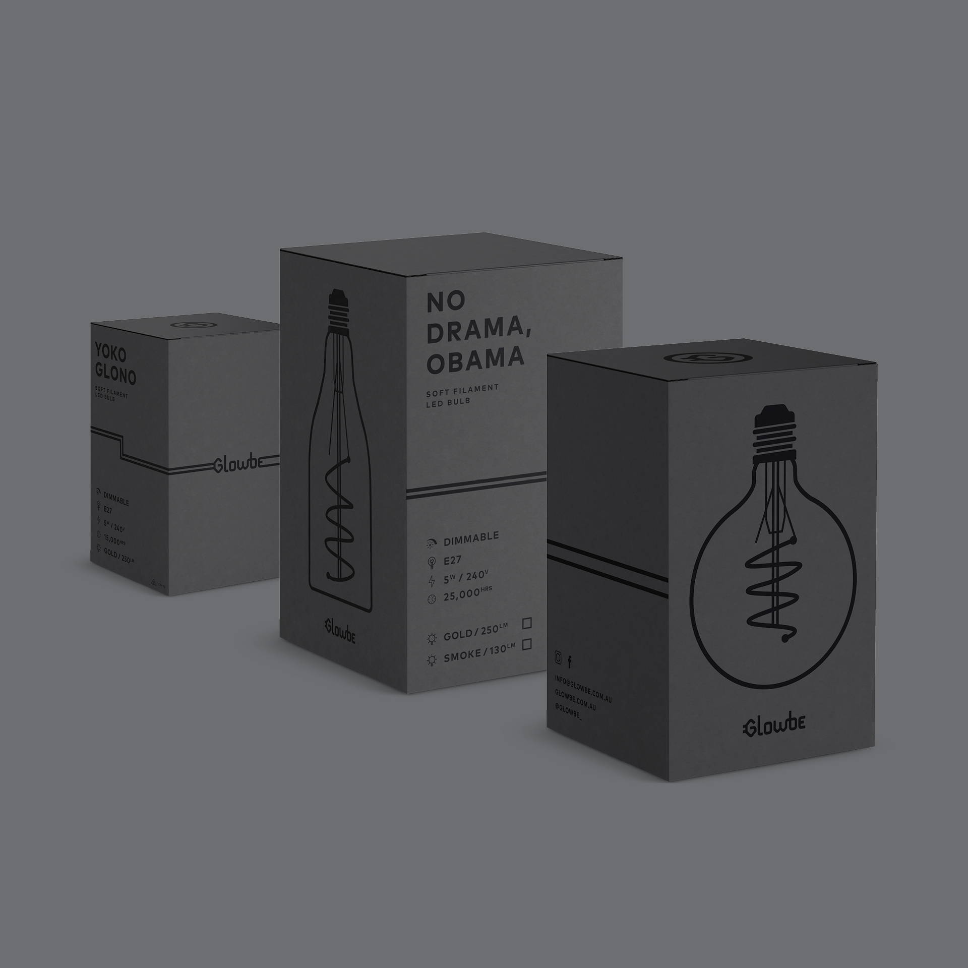 Three Glowbe light globe packages grey with black illustrations