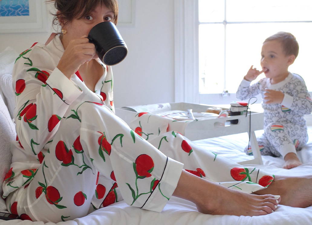 Katherine Omerod wears the YOLKE's  Orange Print Classic Silk Pyjamas