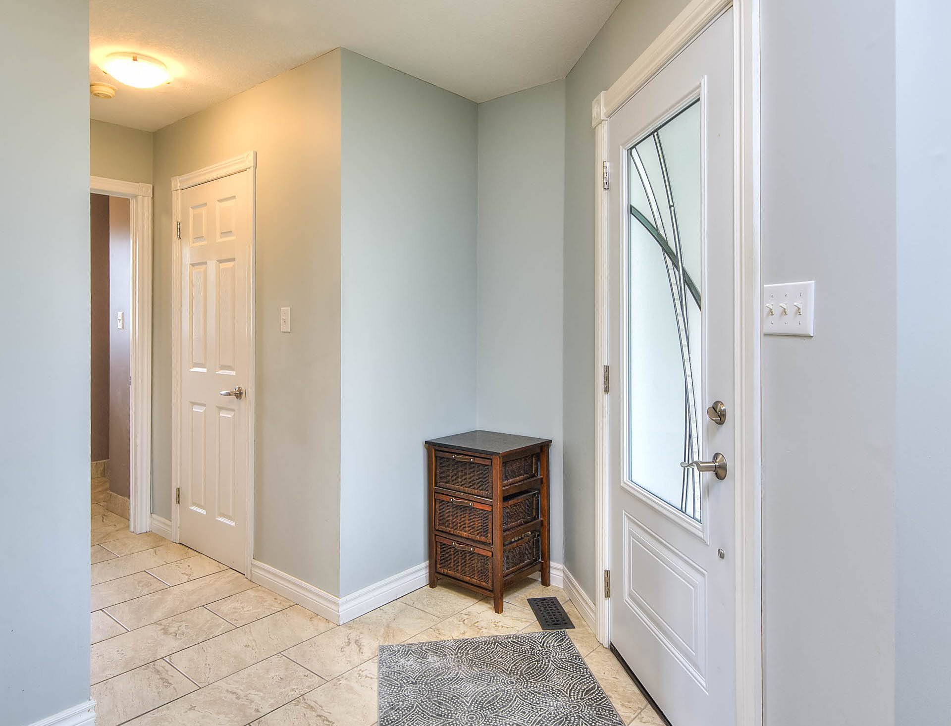 foyer with tile flooring