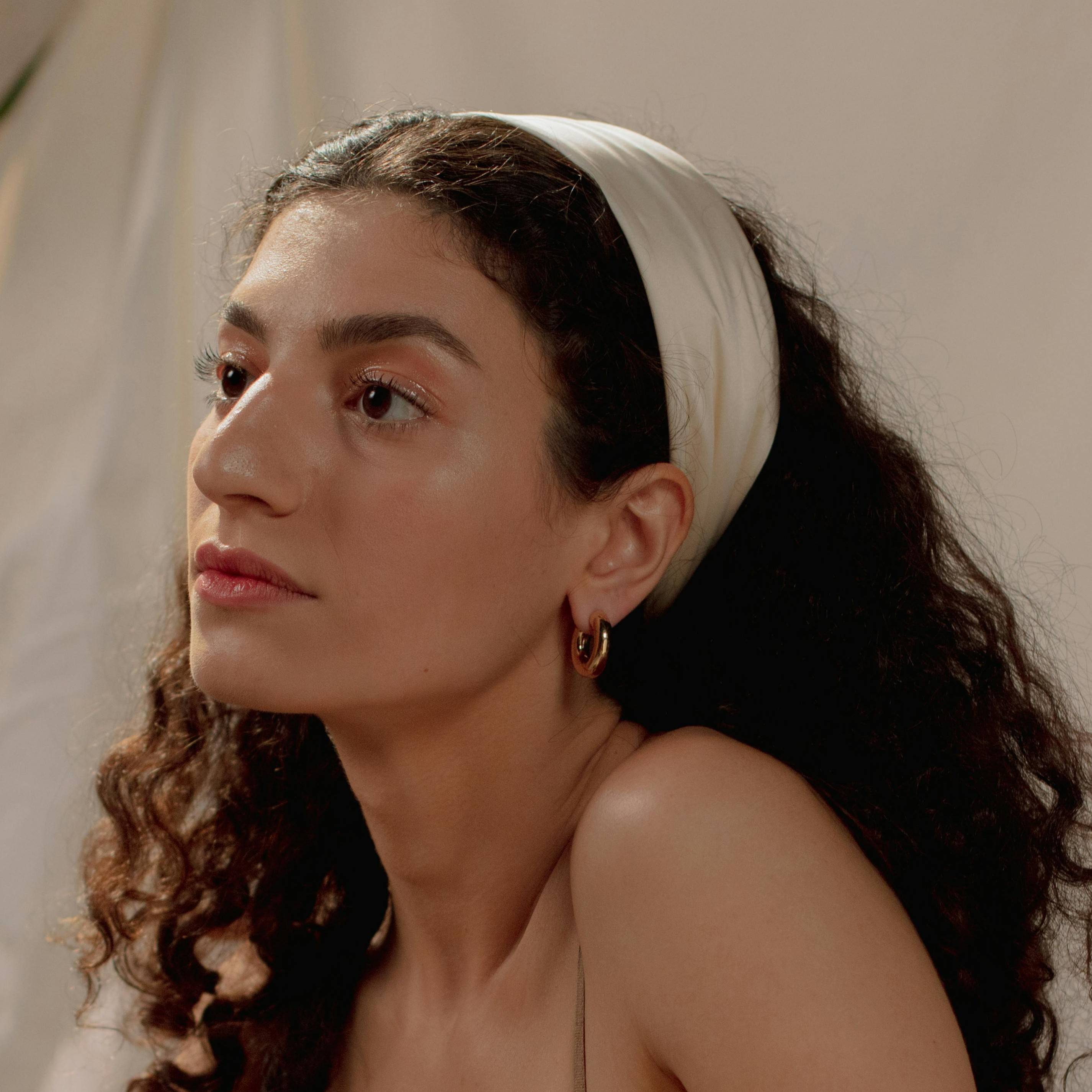 woman with white headband