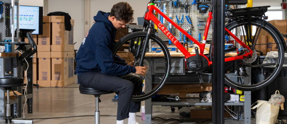 A man working on an e-bike