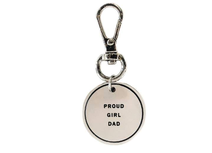 Circular keychain charm engraved with "Proud Girl" in silver