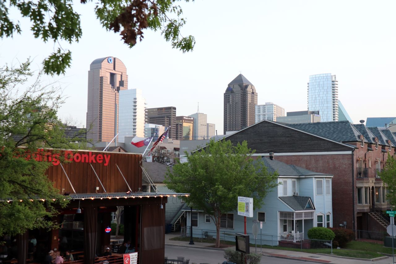 View from a balcony in Uptown Dallas, a neighborhood gentrified after the black people who formed Freedman Town were displaced by racial violence, redlining, and the construction of US Highway 75. Photo by Hexel Colorado.
