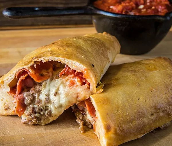 Photo of Loaded Sausage and Pepperoni Calzone 