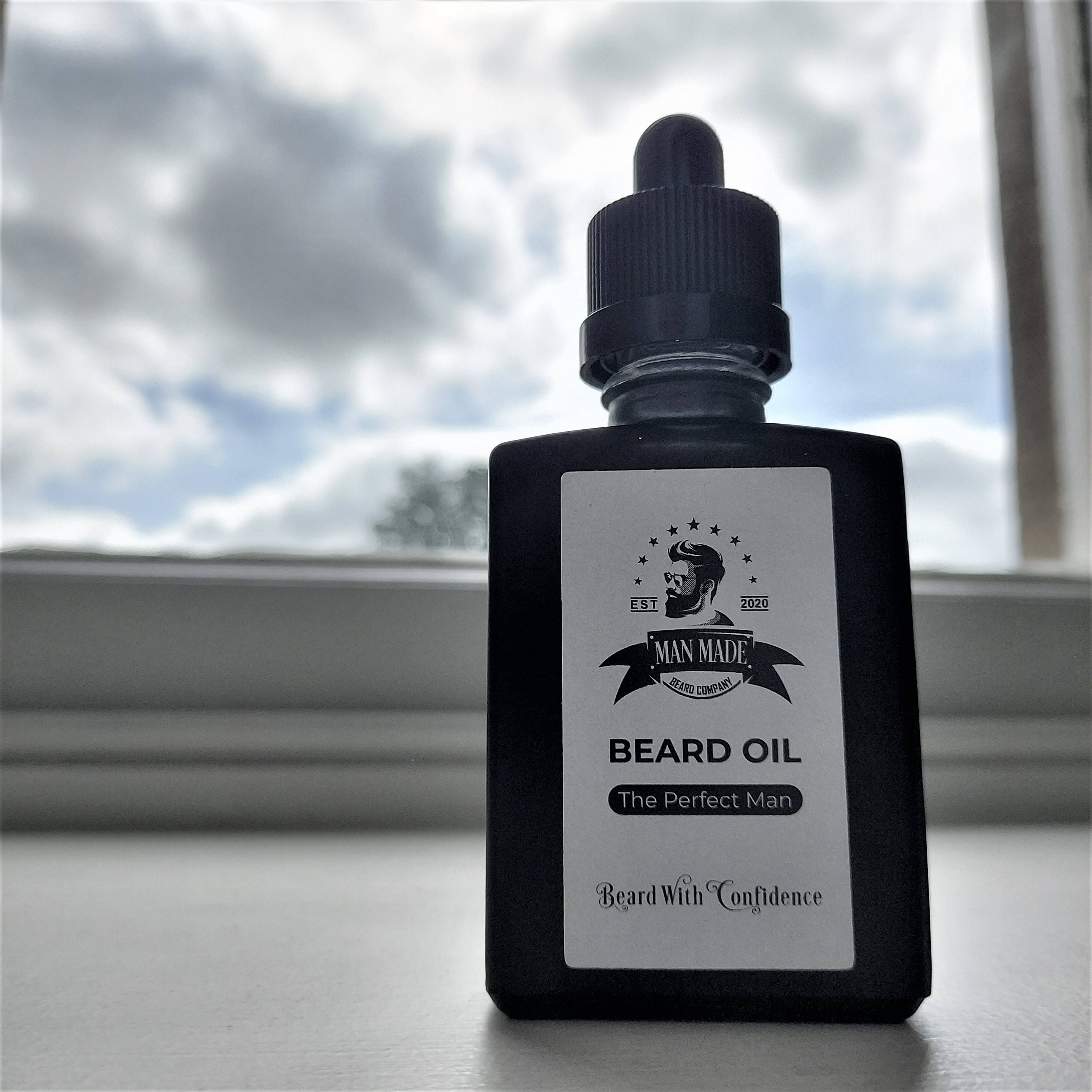 The perfect man beard oil pictured in a hotel room at de vere tortworth court