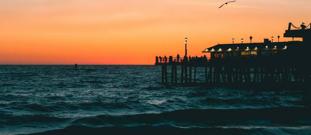 Sunset over the pacific with a pier