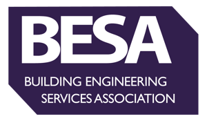 Logo of the Building Engineering Services Association (BESA) with white text on a purple background. The acronym BESA is prominently featured above the full name of the organization.