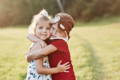 Boy and a girl hugging.