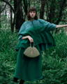 Model holding NOIRANCA handbag Alice in Olive Green