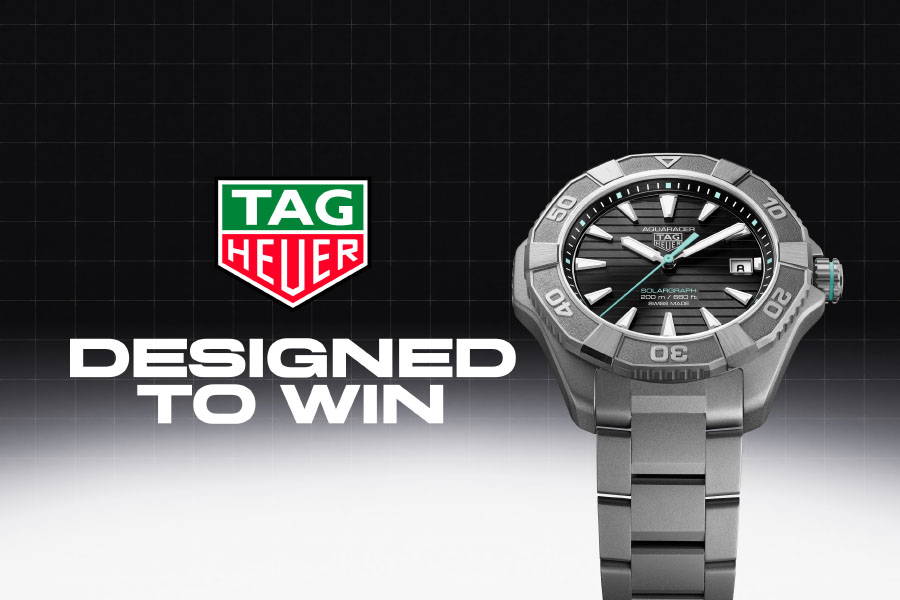 TAG Heuer - Designed to Win Banner Featuring Aquaracer Watch Tag Heuer watch with 'Designed to Win' text on a black background
