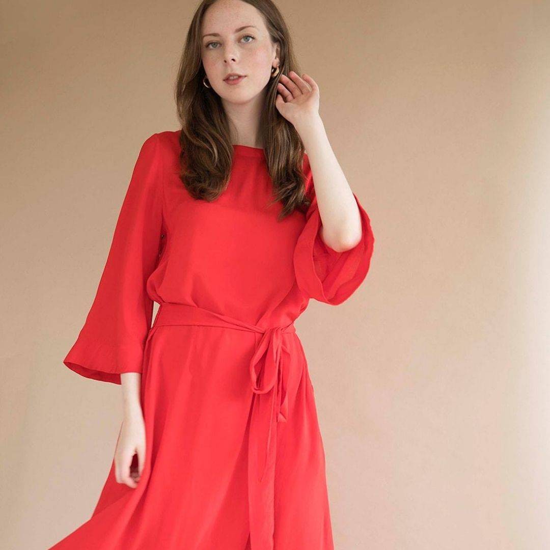 tomoko bell sleeve midi dress in red on model