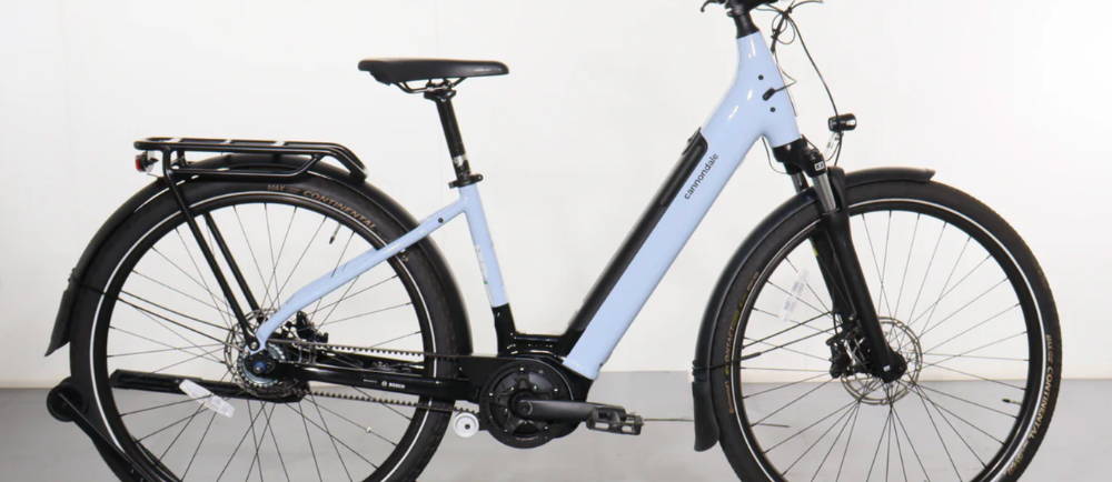 a light blue Cannondale Mavaro Neo 3 electric city bike