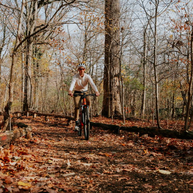 a man on an electric mountain bike
