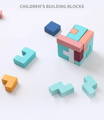 Colorful Montessori Wooden Tetris piece put together in a cube shape. 