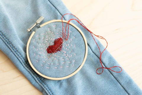 visible mending with a woven heart mini weaving patch