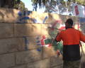 removing graffiti with our sacrificial anti-graffiti coating