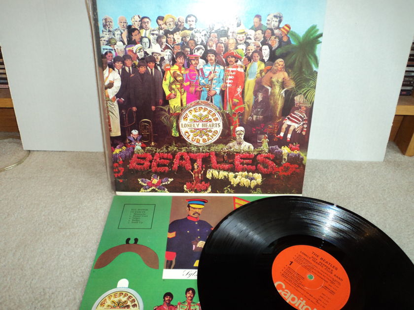 The Beatles - Sgt. Peppers Lonely Hearts Club Band  - 1976 Capitol SMAS 2653 Orange Label Mint w/ cutout