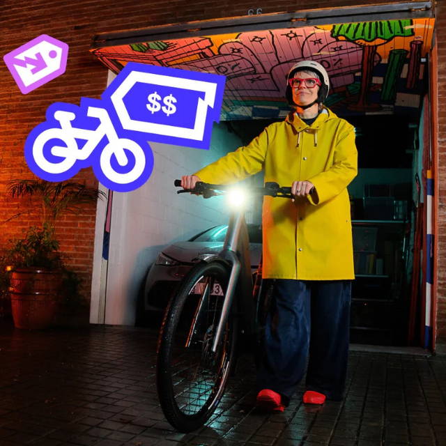 Woman in yellow jacket with electric bike