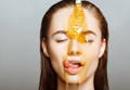 girl with honey drooling all over her skin 