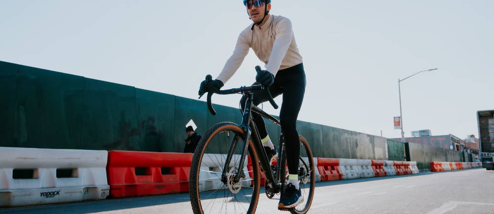 a man riding a Cannondale Topstone Neo electric road bike ona quiet city road