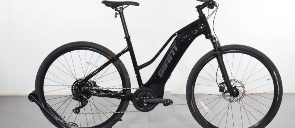a black Giant Roam E+ STA electric city bike
