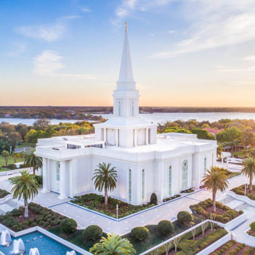 Aerial shot of the Orland Temple with a lake in the background.