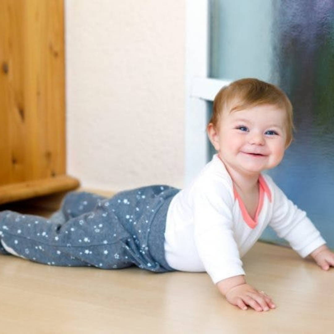 Happy baby commando crawling