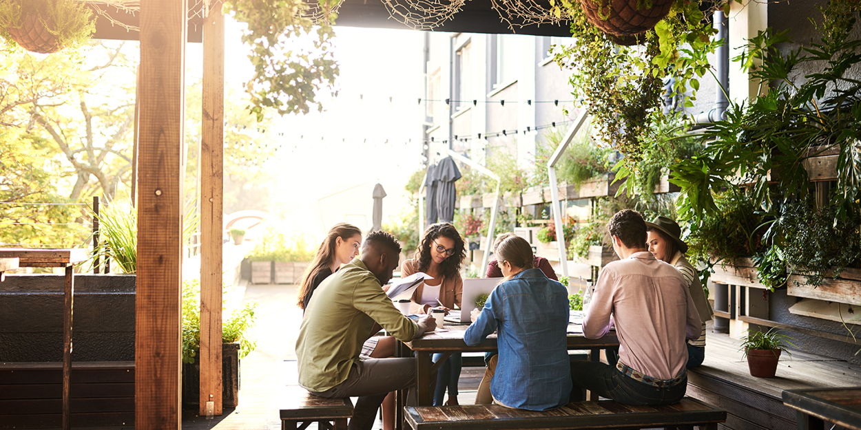 A corporate group meeting at a picturesque mountain ranch