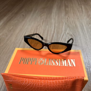 Poppy Lissiman cat eye sunglasses yellow lenses