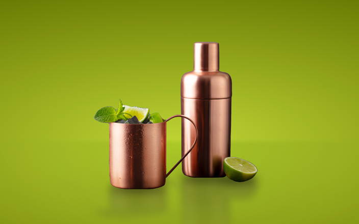 Wellness elixir mocktail in a copper mug and a shaker (preview)