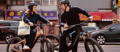 Two electric bikers in Chinatown NYC