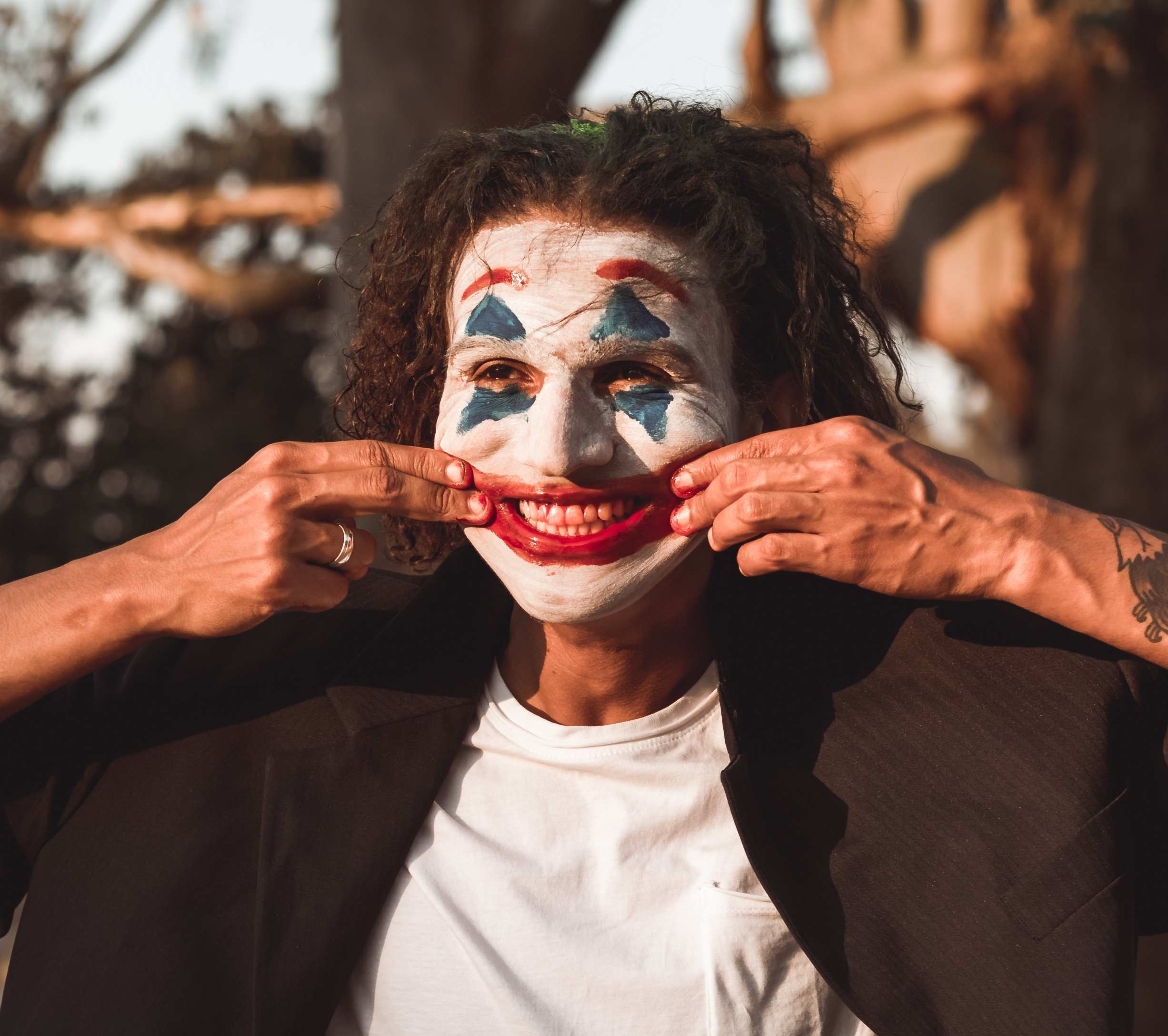 Man wearing joker makeup 
