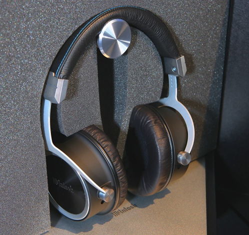 A pair of MHP1000 headphones shown in the packaging