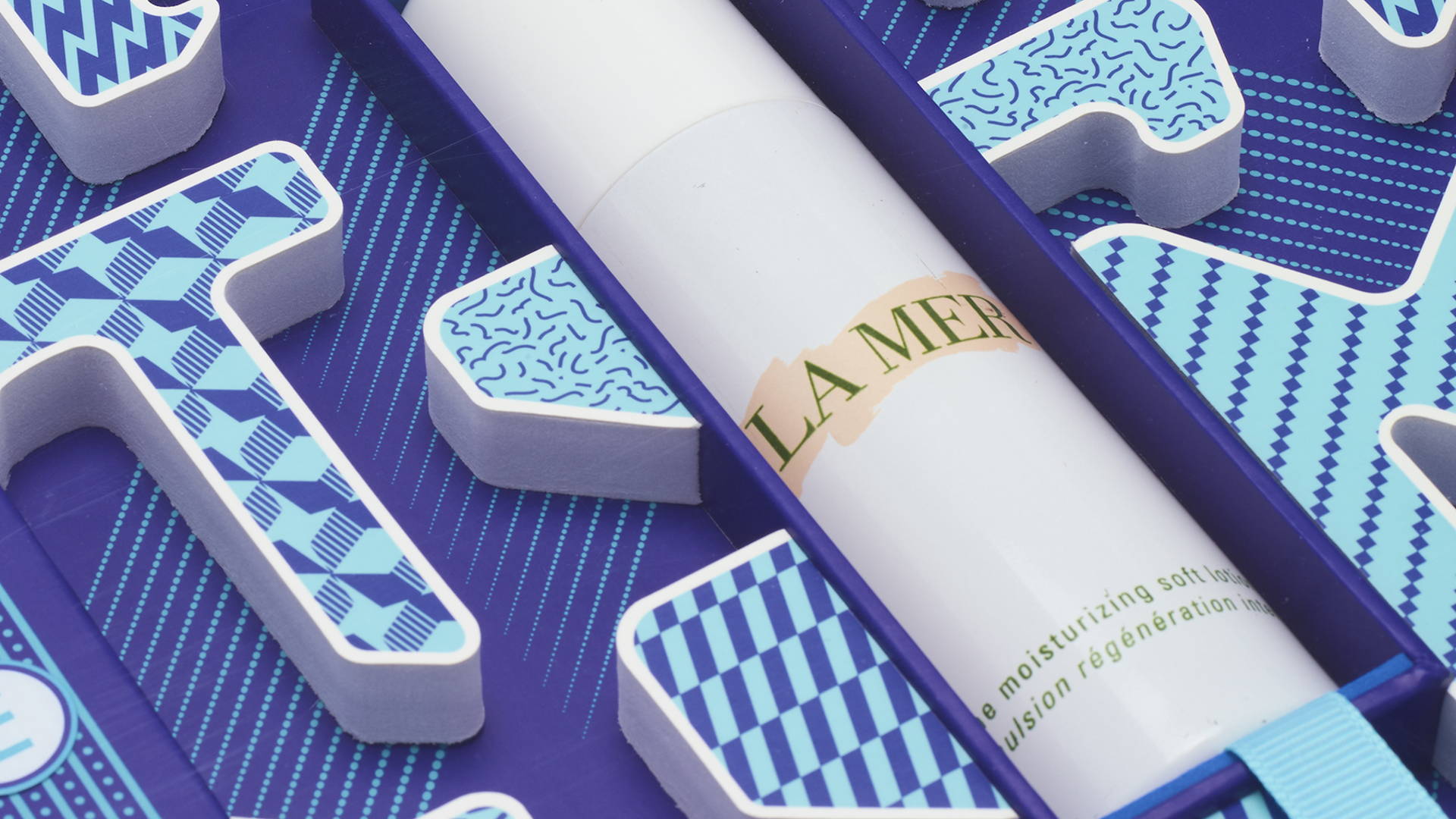 Featured image for This Lotion Comes in a Box Inspired by Pinball Machines and Chinese Puzzles